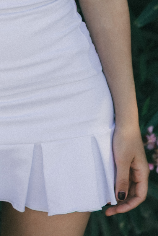 Mujer con falda de padel  tablas color blanco - Plano detalle